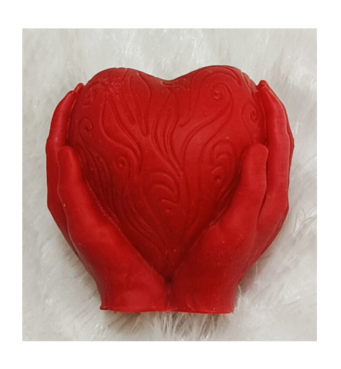 Hands Holding Heart candle